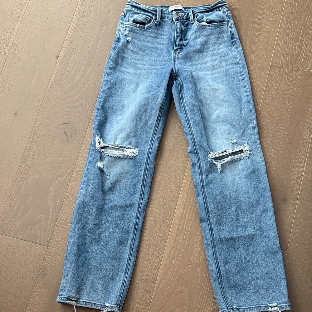 Women's Distressed Blue Jeans